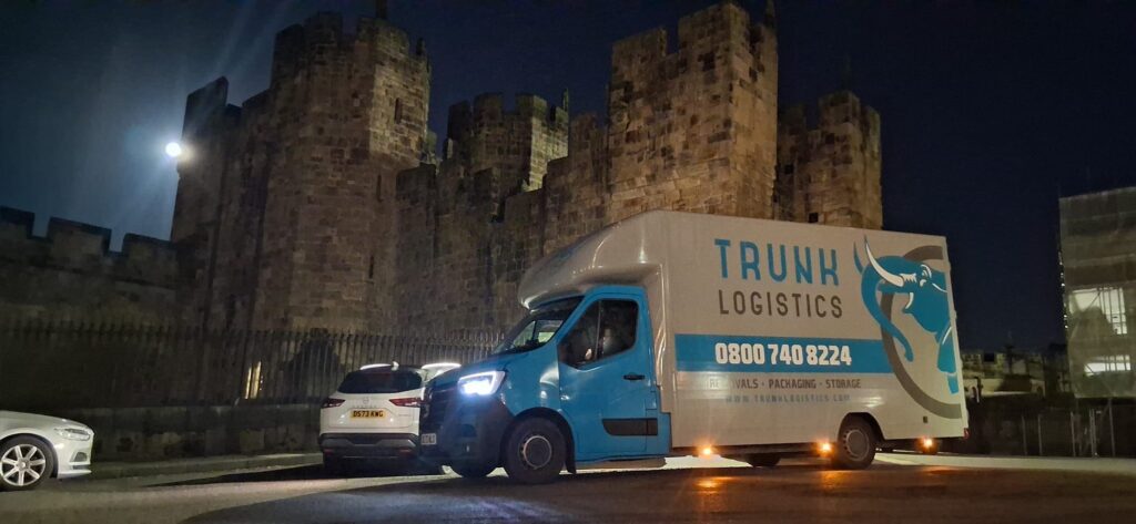 Trunk Logistics removal van parked at Alnwick Castle during residential move