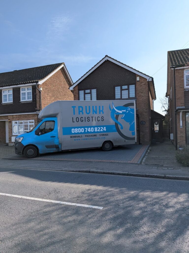 Trunk Logistics removal van outside UK home during house move with full load service