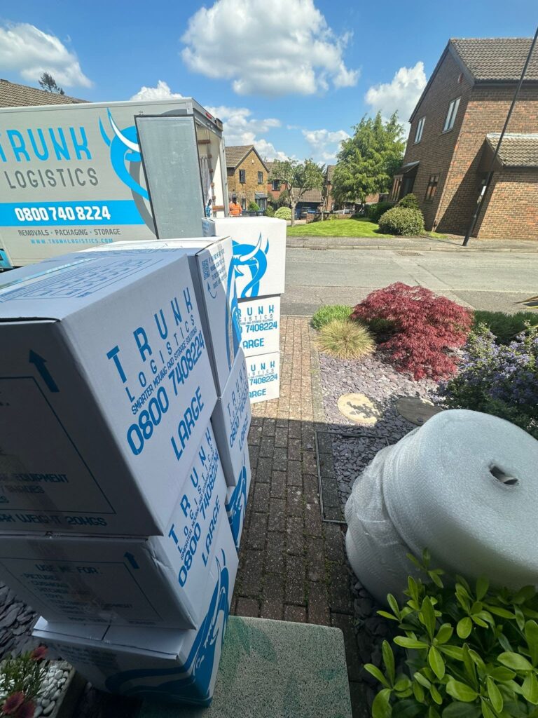 Moving boxes and packing materials prepared outside home before removal