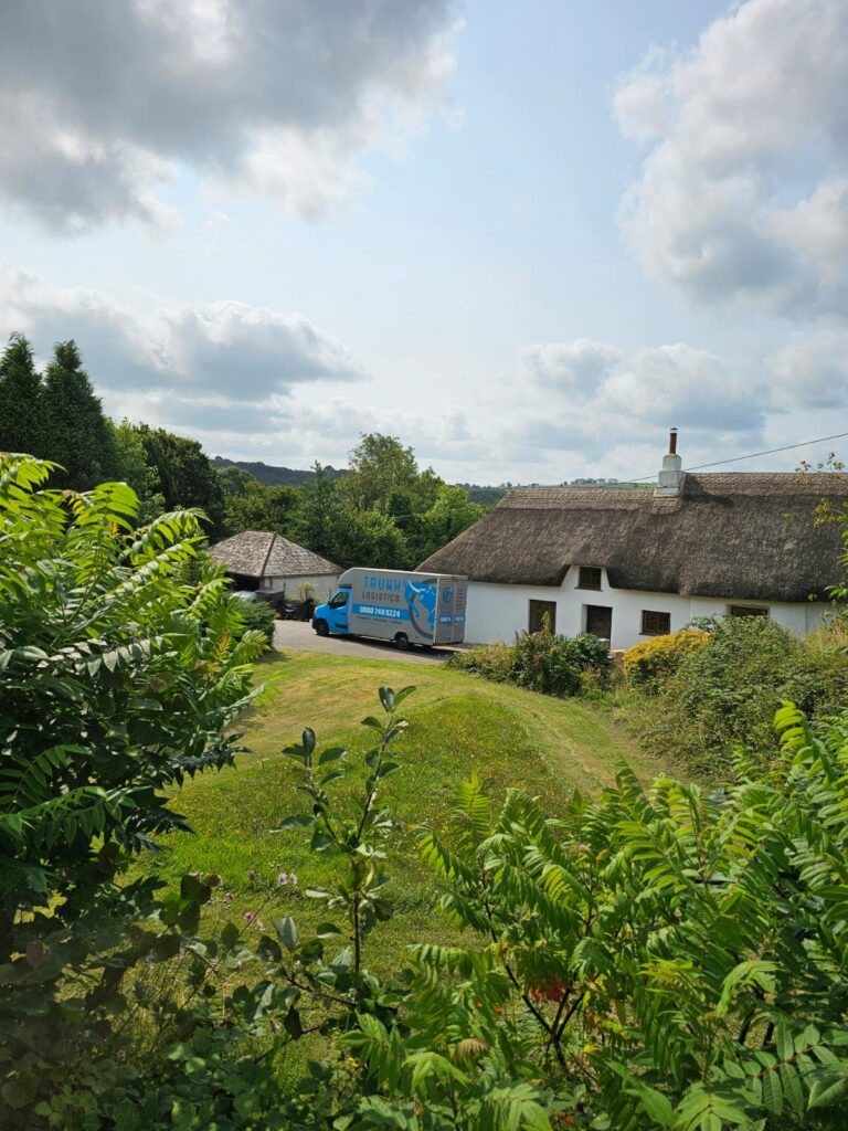 Trunk Logistics removal van at rural property in Plymouth during house move