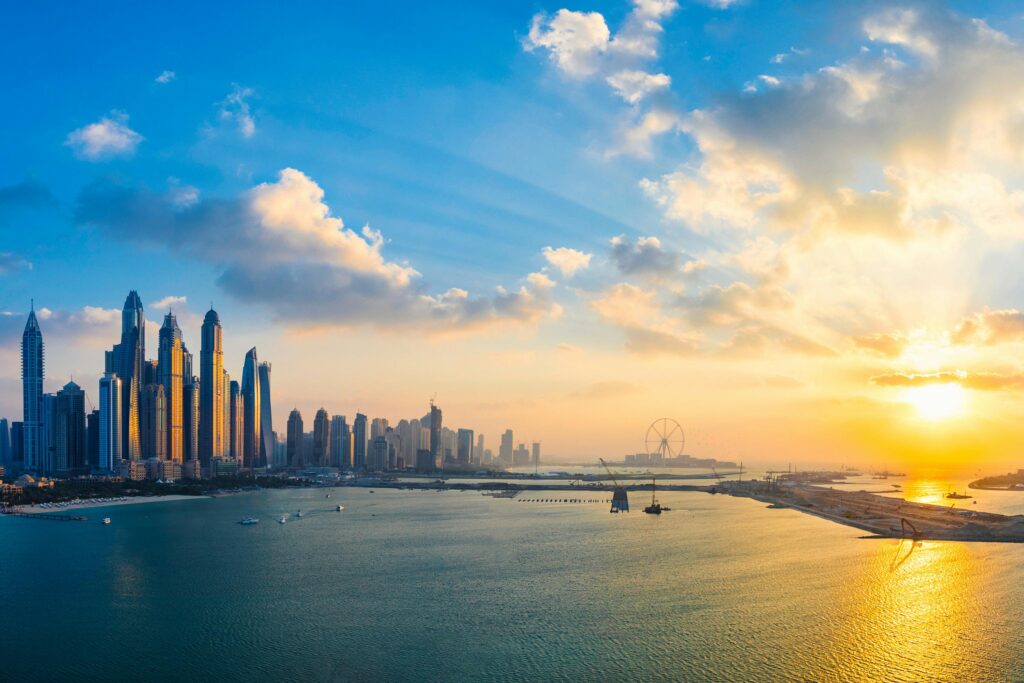 Aerial view of Dubai Marina skyscrapers and coastline at sunset — destination image for Trunk Logistics UK to Dubai international removals guide