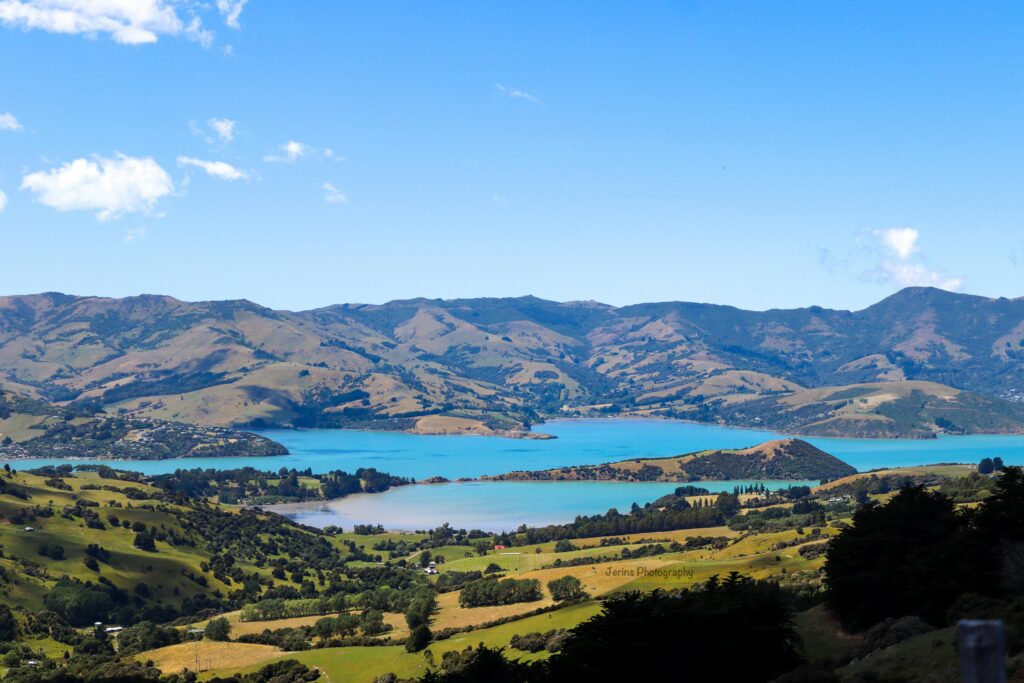 Aerial view of Akaroa harbour and Canterbury hills in New Zealand — destination image for Trunk Logistics UK to New Zealand international removals guide