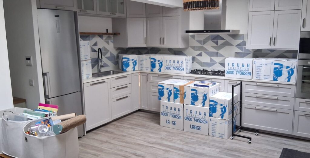 Professional packing service preparing boxes for a home move