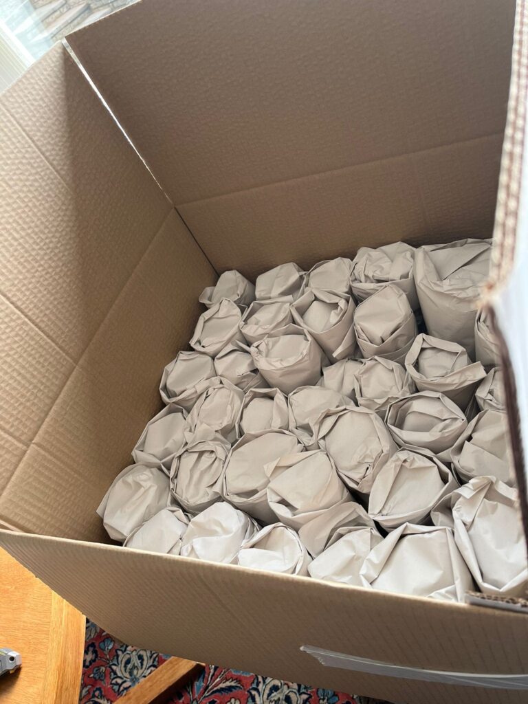 Trunk Logistics Fragile Item Packing — Individually Paper-Wrapped Contents in Removal Box