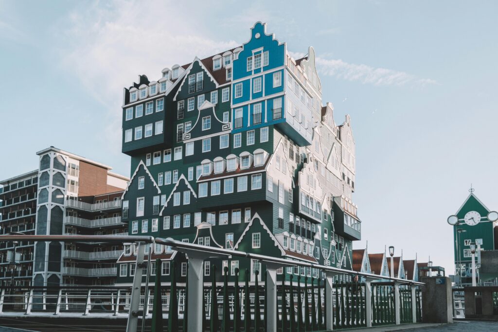 Zaandam Inntel Hotel with stacked Dutch gabled architecture in green and blue — UK to Netherlands removals to Noord-Holland and the wider Amsterdam region by Trunk Logistics