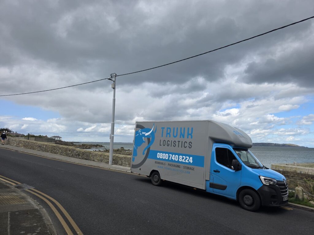 Trunk Logistics removal van on the Dublin Bay coastal road — UK to Ireland removals service