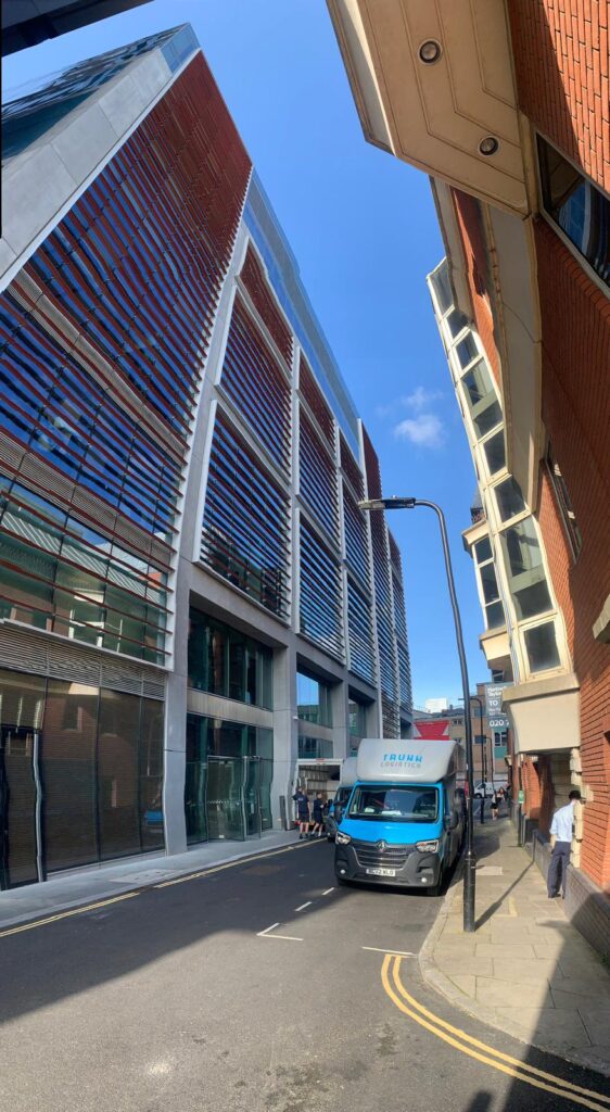 Trunk Logistics removal van navigating a narrow central London street during a residential removal