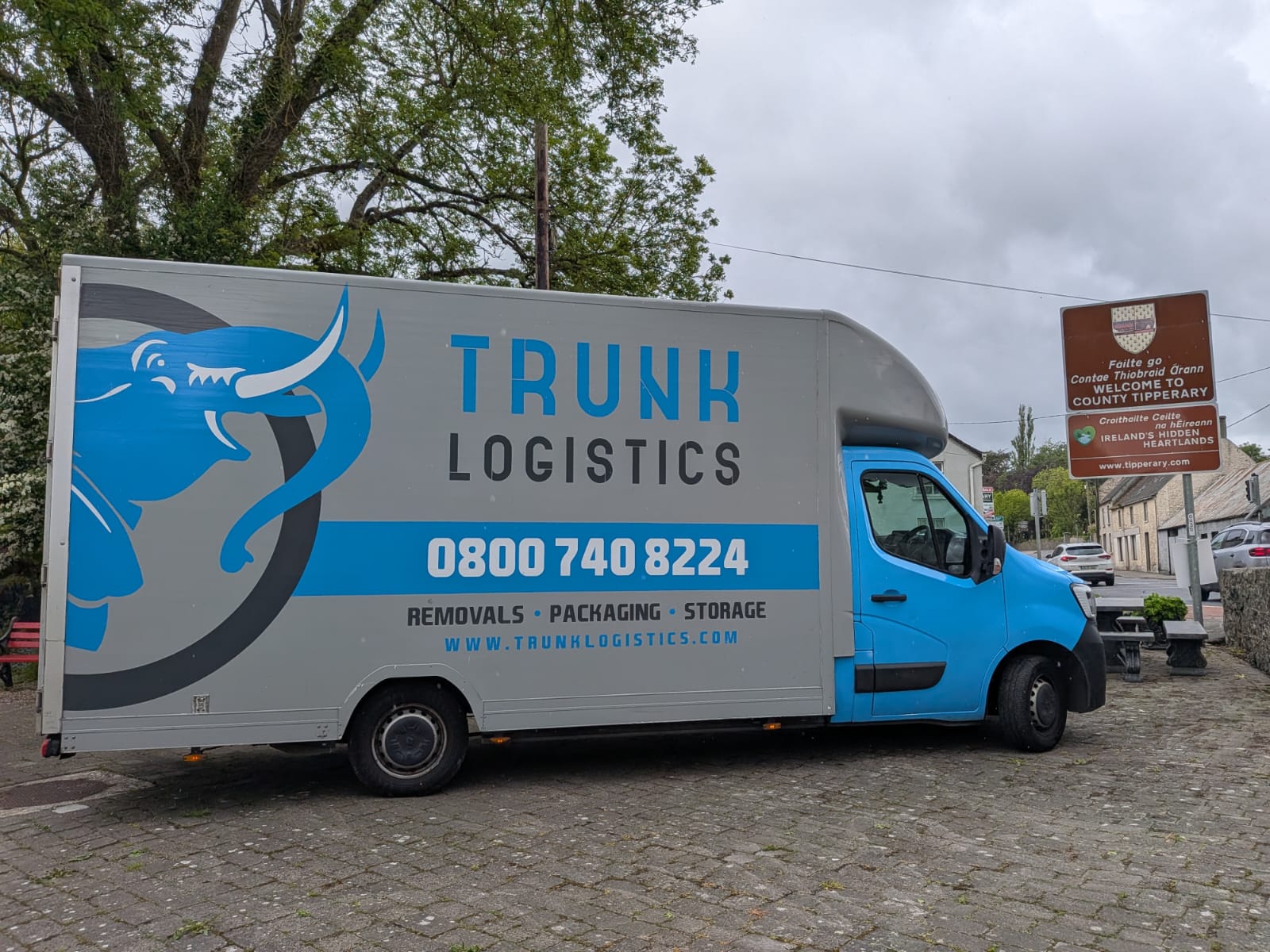 Trunk Logistics removal van beside the Welcome to County Tipperary sign — Ireland to UK removals collecting from County Tipperary